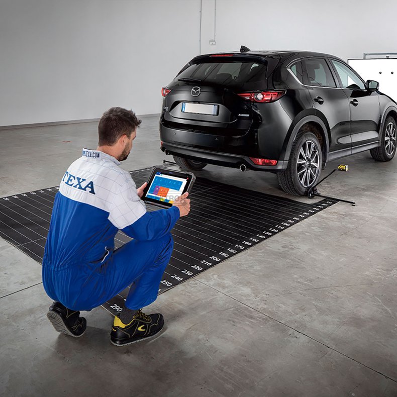 Kalibreringsmtte med hjulcentreringsbeslag og laserlibelle